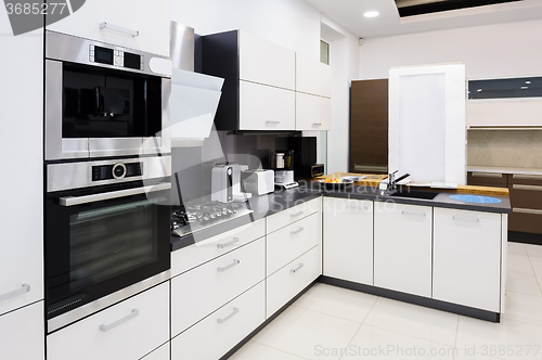 Image of Modern hi-tek kitchen, clean interior design