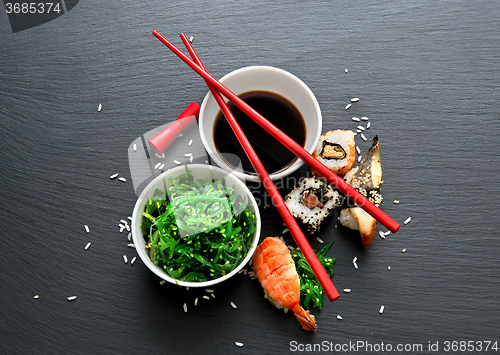 Image of Seaweed salad and sushi