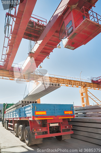 Image of Loading concrete products in onboard car