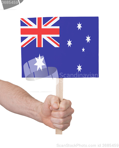 Image of Hand holding small card - Flag of Australia