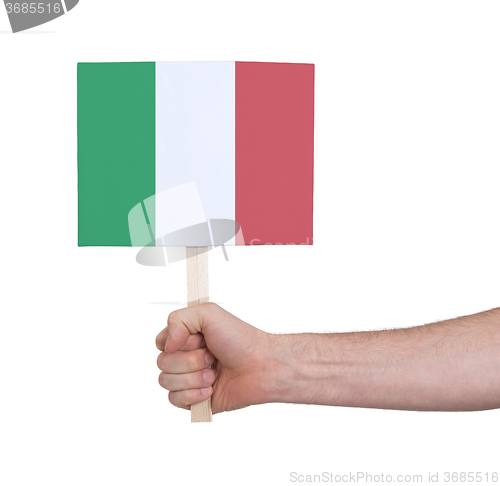 Image of Hand holding small card - Flag of Italy