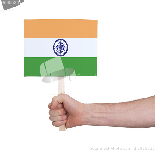 Image of Hand holding small card - Flag of India
