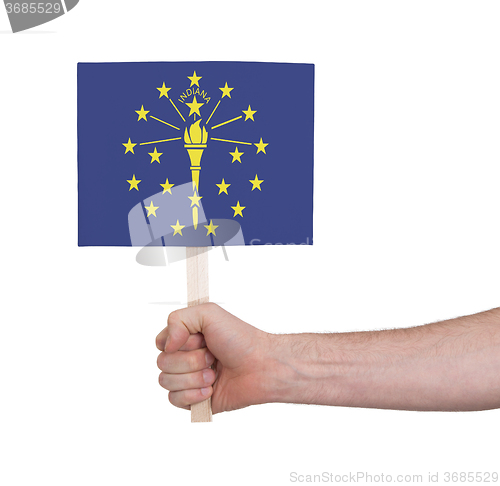 Image of Hand holding small card - Flag of Indiana