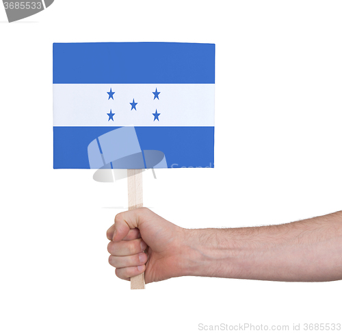 Image of Hand holding small card - Flag of Honduras