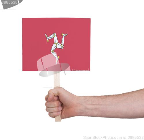 Image of Hand holding small card - Flag of Isle of man