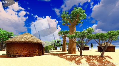 Image of African village with traditional huts 