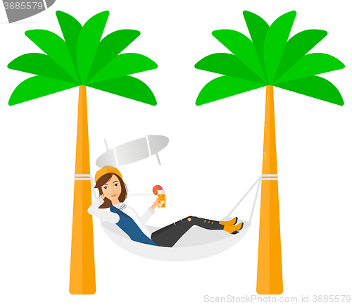 Image of Woman chilling in hammock.