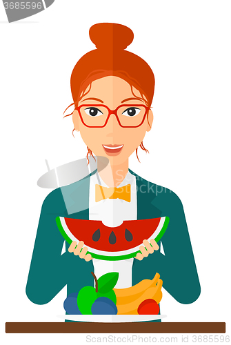 Image of Woman eating watermelon.
