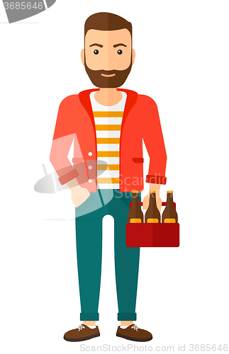 Image of Man with pack of beer.