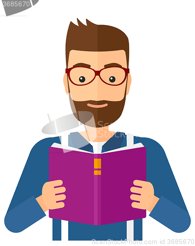Image of Man reading book.