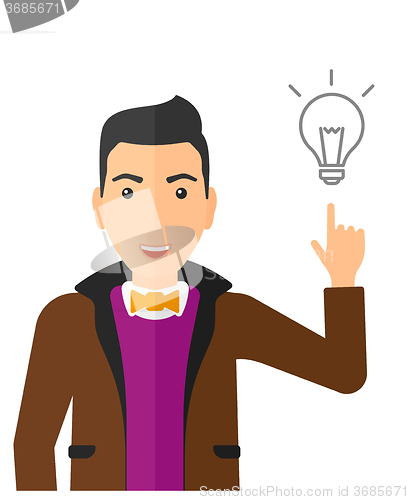 Image of Man pointing at light bulb.