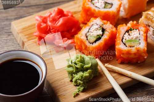 Image of Closeup of sushi with soy sauce