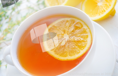 Image of Fresh tea with lemon in the white cup