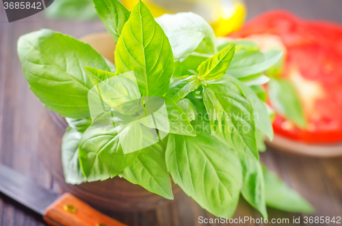 Image of tomato with basil