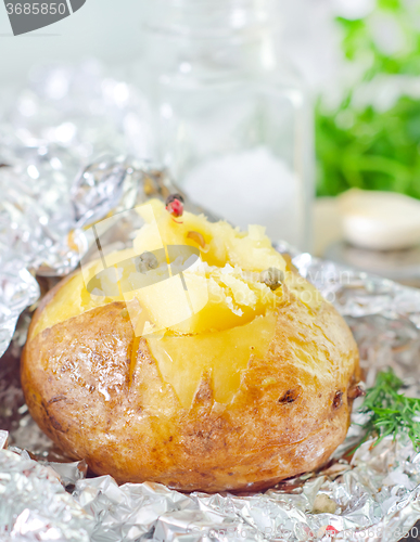 Image of baked potato in foil