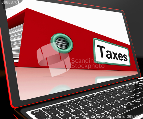 Image of Taxes File On Laptop Shows Online Payment