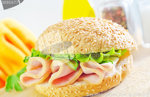 Image of sandwich with ham and cucumber