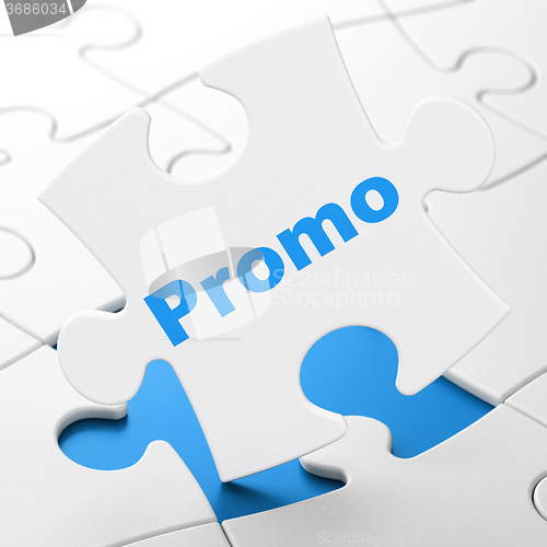 Image of Marketing concept: Promo on puzzle background