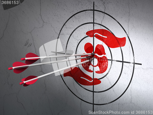 Image of Insurance concept: arrows in Family And Palm target on wall background