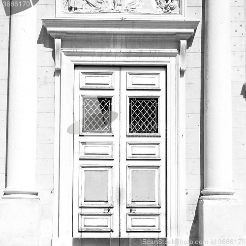 Image of detail in  wall door  italy land europe architecture and wood th