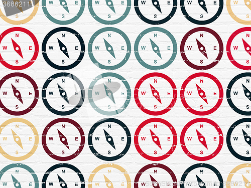 Image of Tourism concept: Compass icons on wall background