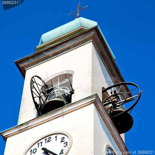 Image of ancien clock tower in italy europe old  stone and bell