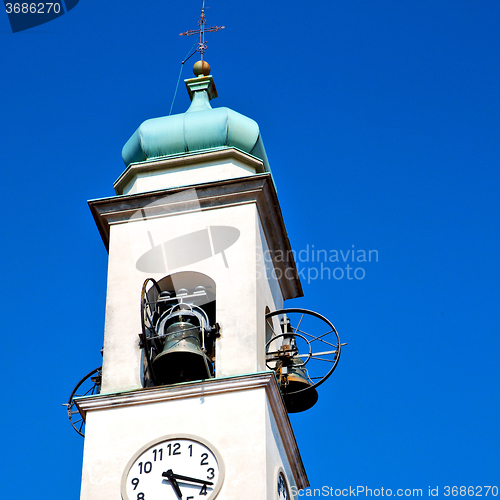 Image of ancien clock tower in italy europe old  stone and bell