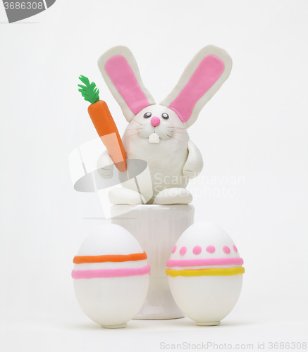 Image of plasticine rabbit with easter egg