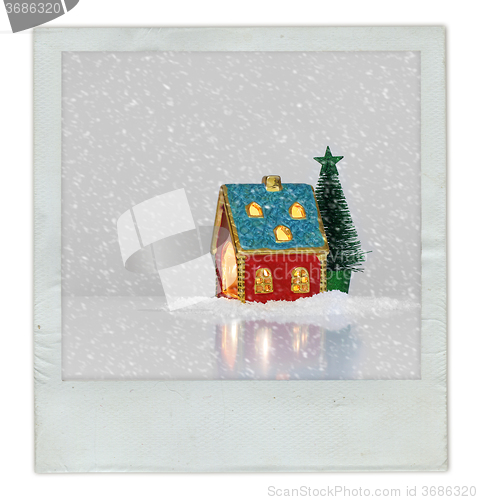 Image of Christmas card with festive light in house