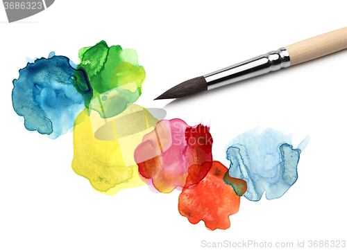 Image of Brush and abstract circle watercolor painting