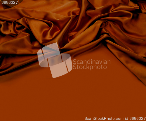 Image of brown chocolate silk fabric background