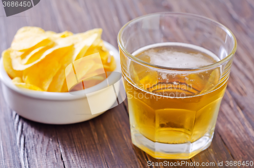 Image of chips from potato with beer