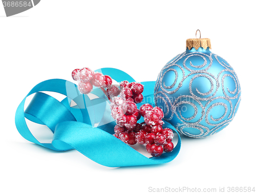 Image of turquoise christmas ball with ribbon