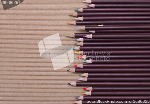 Image of Colored pencils on cardboard