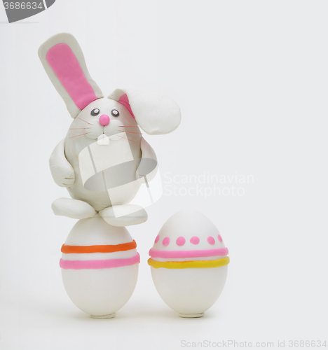 Image of plasticine rabbit with easter eggs