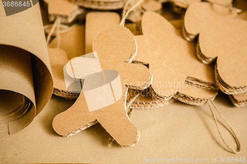 Image of Cardboard toys for the Christmas tree or garland. Creative decorations. Selective Focus