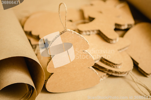 Image of Cardboard toys for the Christmas tree or garland. Creative decorations. Selective Focus