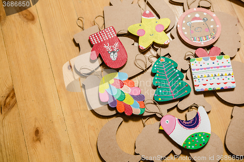 Image of Cardboard toys for the Christmas tree or garland. New year decorations.