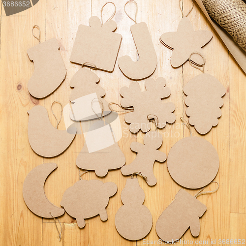 Image of Cardboard toys for the Christmas tree or garland. New year decorations.