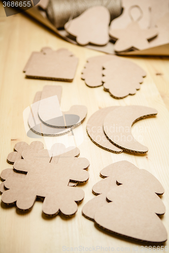 Image of Cardboard toys for the Christmas tree or garland. New year decorations.