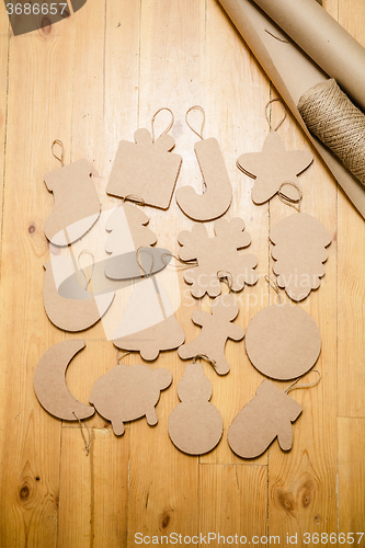 Image of Cardboard toys for the Christmas tree or garland. New year decorations.