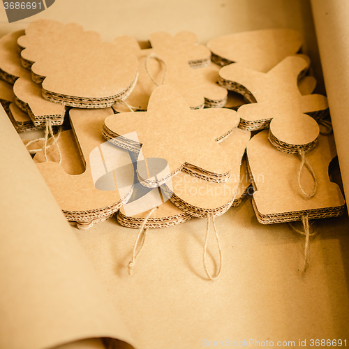 Image of Cardboard toys for the Christmas tree or garland. Creative decorations. Selective Focus