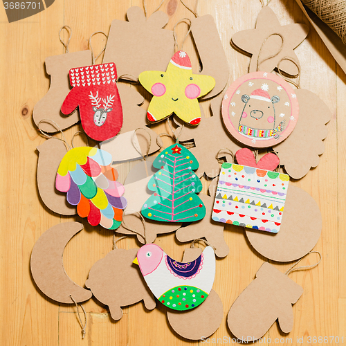 Image of Cardboard toys for the Christmas tree or garland. New year decorations.