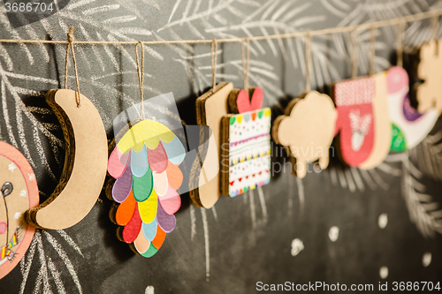 Image of Cardboard toys for the Christmas tree or garland. Creative decorations. Selective Focus