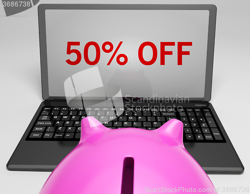 Image of Fifty Percent Off On Notebook Showing Big Savings