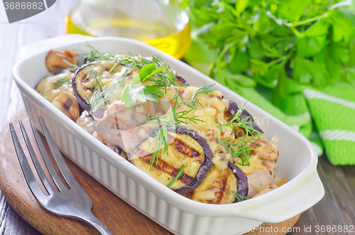 Image of eggplants with meat and cheese