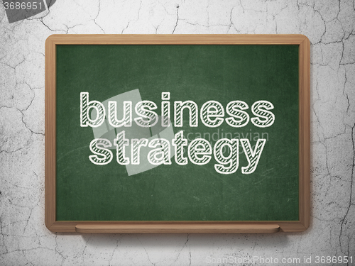 Image of Finance concept: Business Strategy on chalkboard background