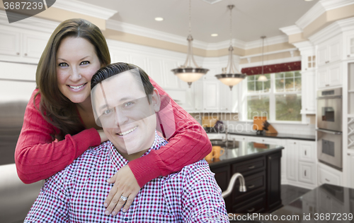 Image of Happy Couple In Beautiful New Kitchen
