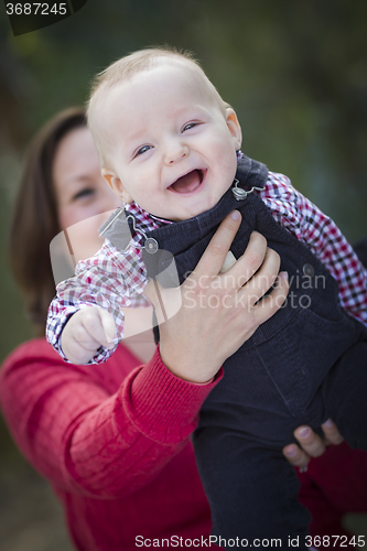 Image of Little Baby Boy Having Fun With Mommy Outdoors