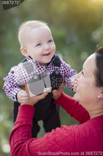 Image of Little Baby Boy Having Fun With Mommy Outdoors